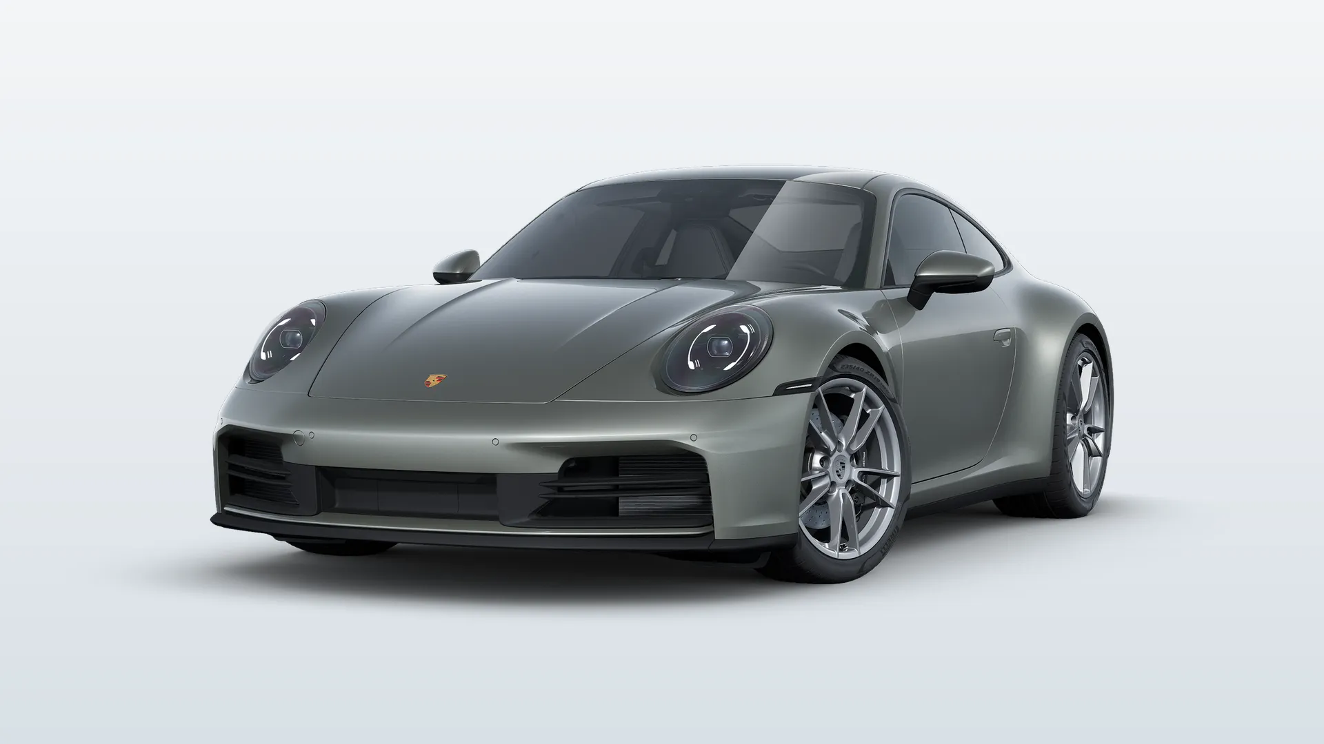 Porsche 911 (992.2) 911 Carrera v barvě Aventurine zelená metalíza – pohled zepředu