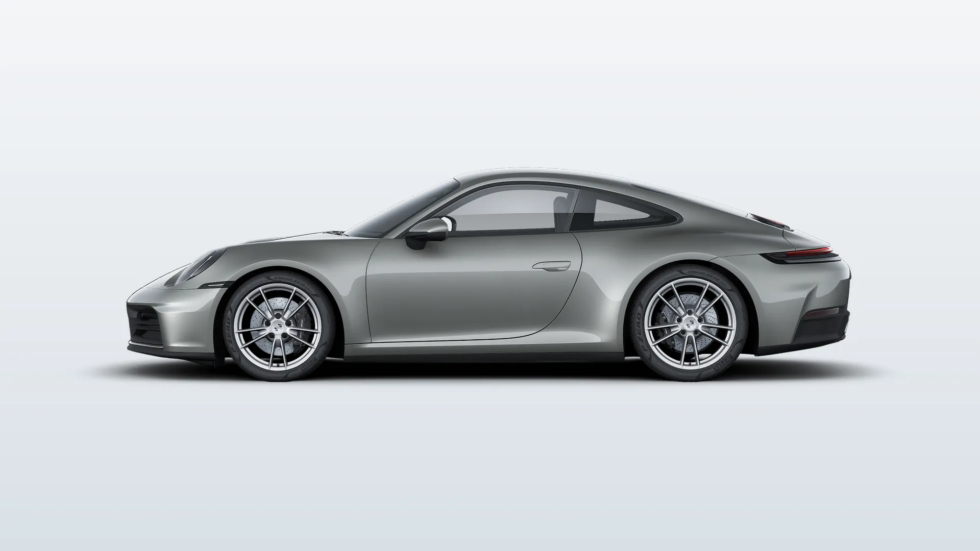 Porsche 911 (992.2) 911 Carrera v barvě Aventurine zelená metalíza – pohled z boku