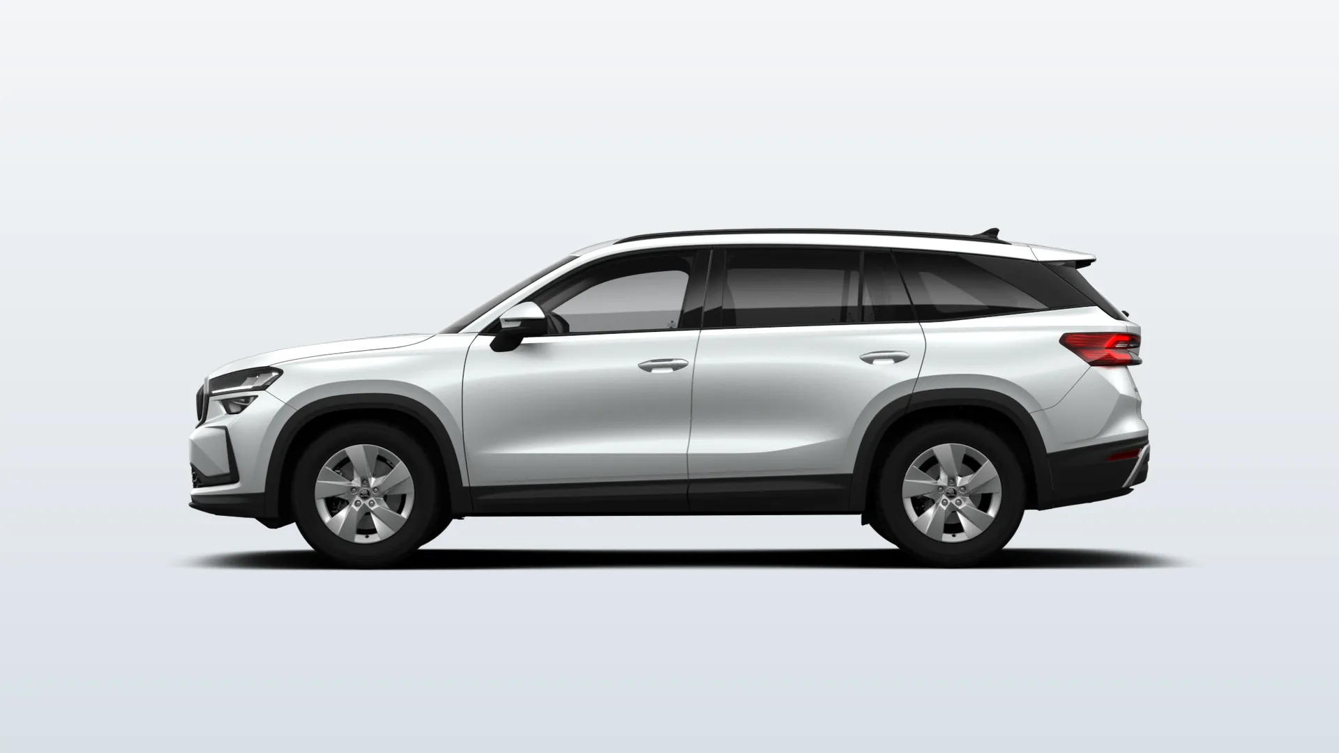 Škoda Kodiaq II Selection v barvě Bílá Moon metalíza – pohled z boku