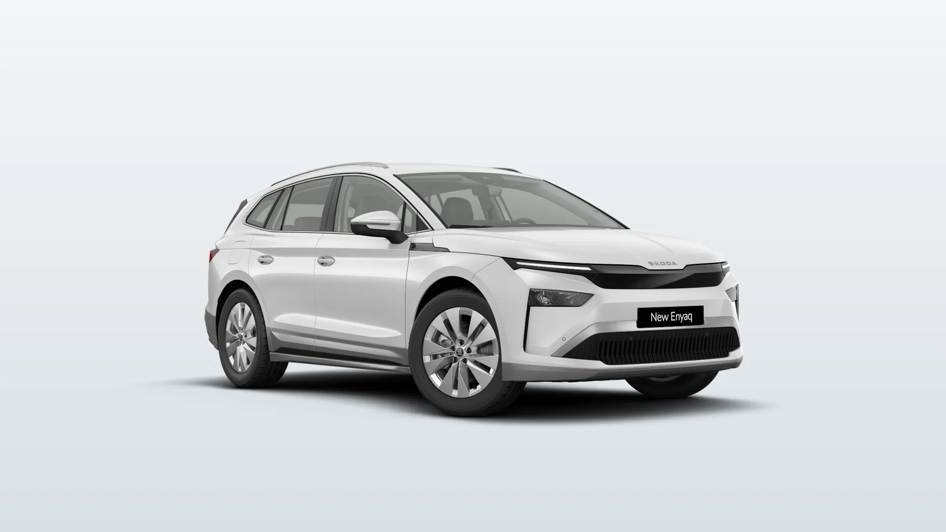 Škoda Enyaq iV (facelift 2025) Selection v barvě Bílá Moon metalíza – pohled zepředu